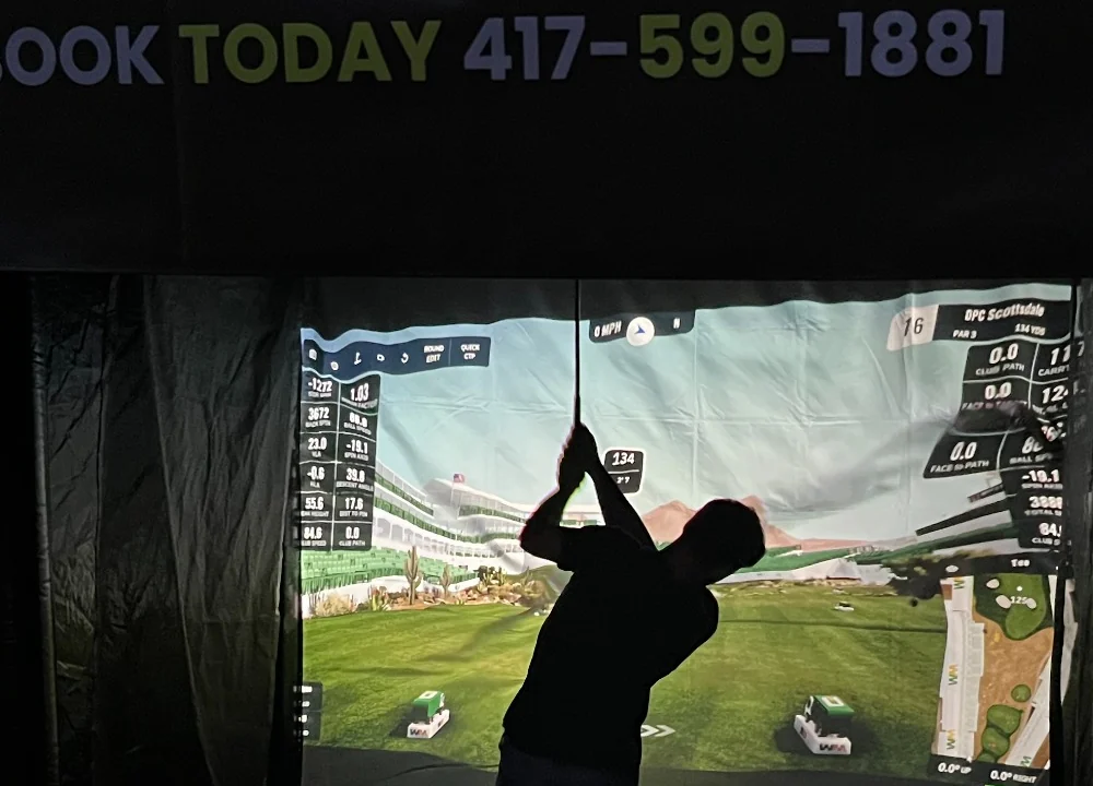 Simulator screen and swing view at night event